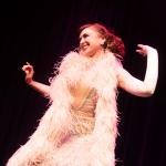 Cabaret performer wearing a feather boa