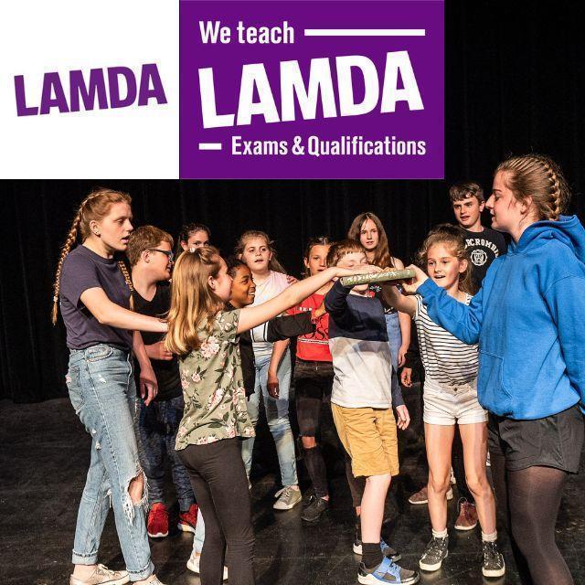 An advert for Lamda showcasing a group of children stood on stage rehearsing a performance.