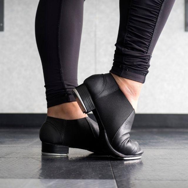 A close up of tap shoes.