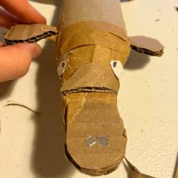 A platypus made out of cardboard